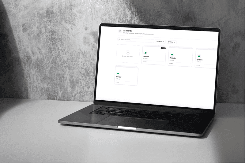 AI Boards interface showing board collections with ad references and AI insights